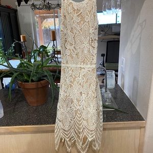 White lace open back mahina dress